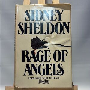 Sidney Sheldon 'Rage of Angels' Book Cover Art - Black and Cream